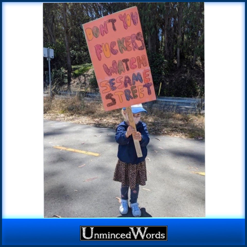 This kid with her sign is awesome